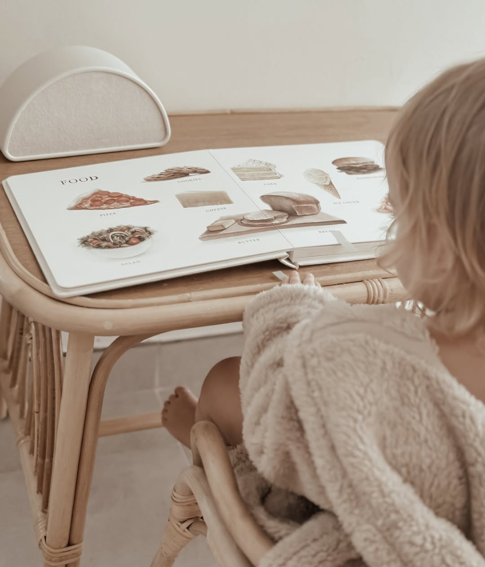 Image of a toddler listening to music on her Shushiie